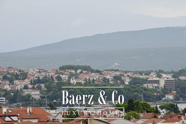 photo 7 Krk, a three-bedroom apartment with a living area 120m2, garden, and basement